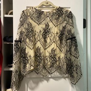 An altered state breezy mesh top.